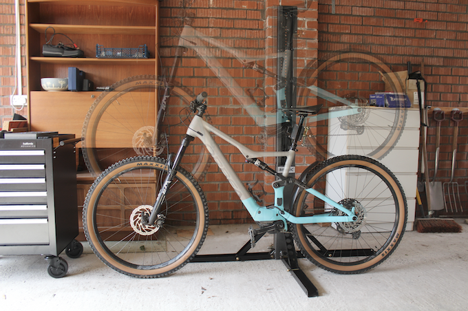 Bikonic gas stand with bike